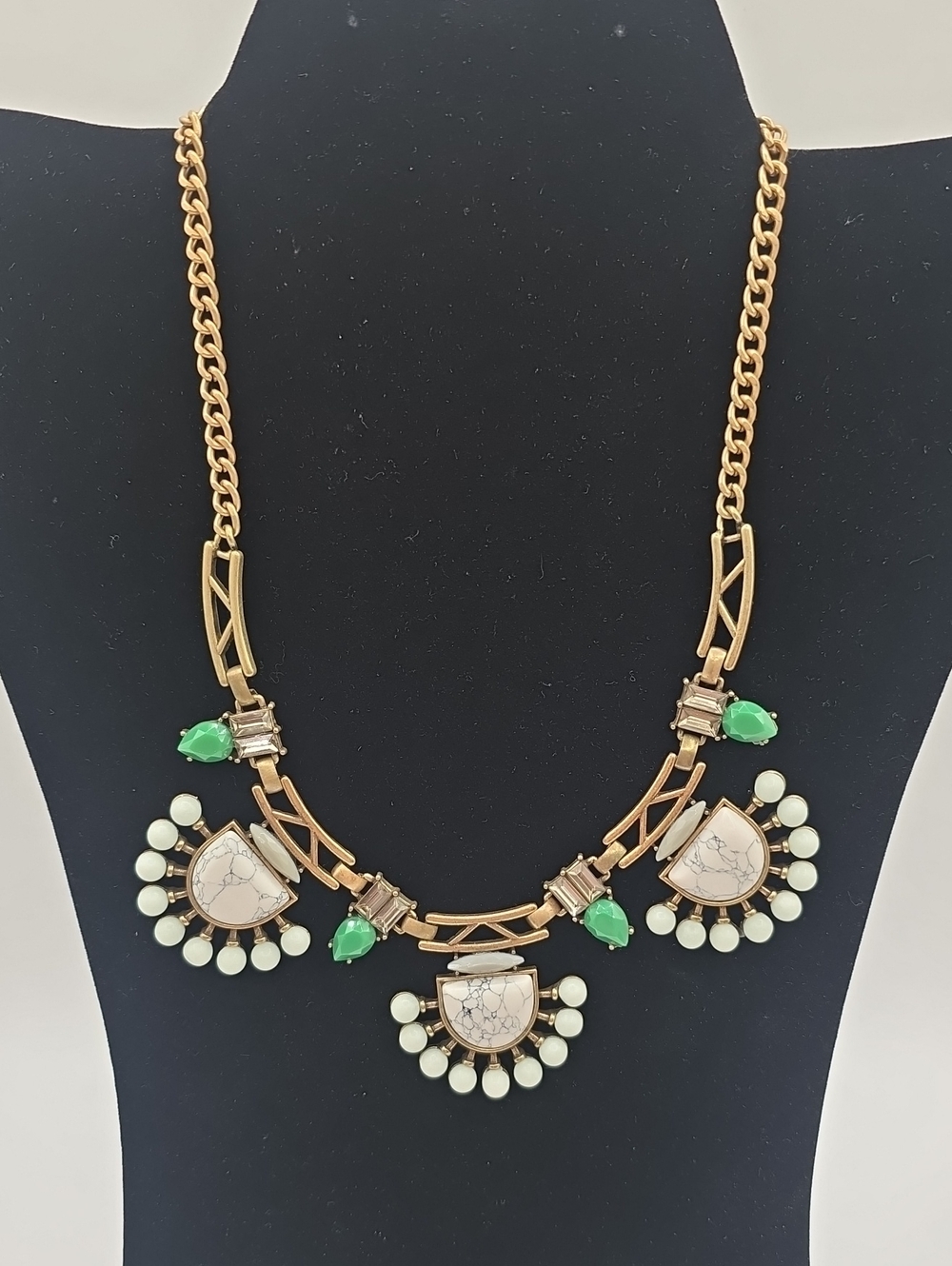 Gold-Tone Statement Necklace with White Marble and Green Accents